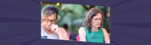 Two women leaders sitting together in quiet reflection, representing the internal struggle of imposter syndrome in women leaders