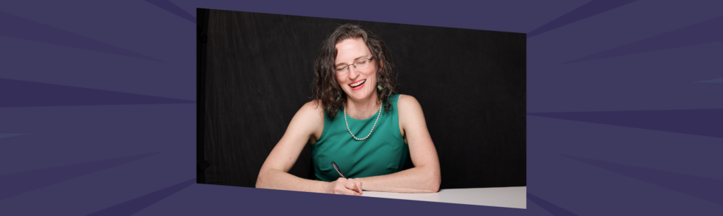 Nettie Owens writing while planning a profitable business strategy designed for sustainable growth.