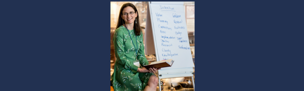 Nettie Owens presenting a 90-day plan framework on a whiteboard during Wake Up Women Leaders
